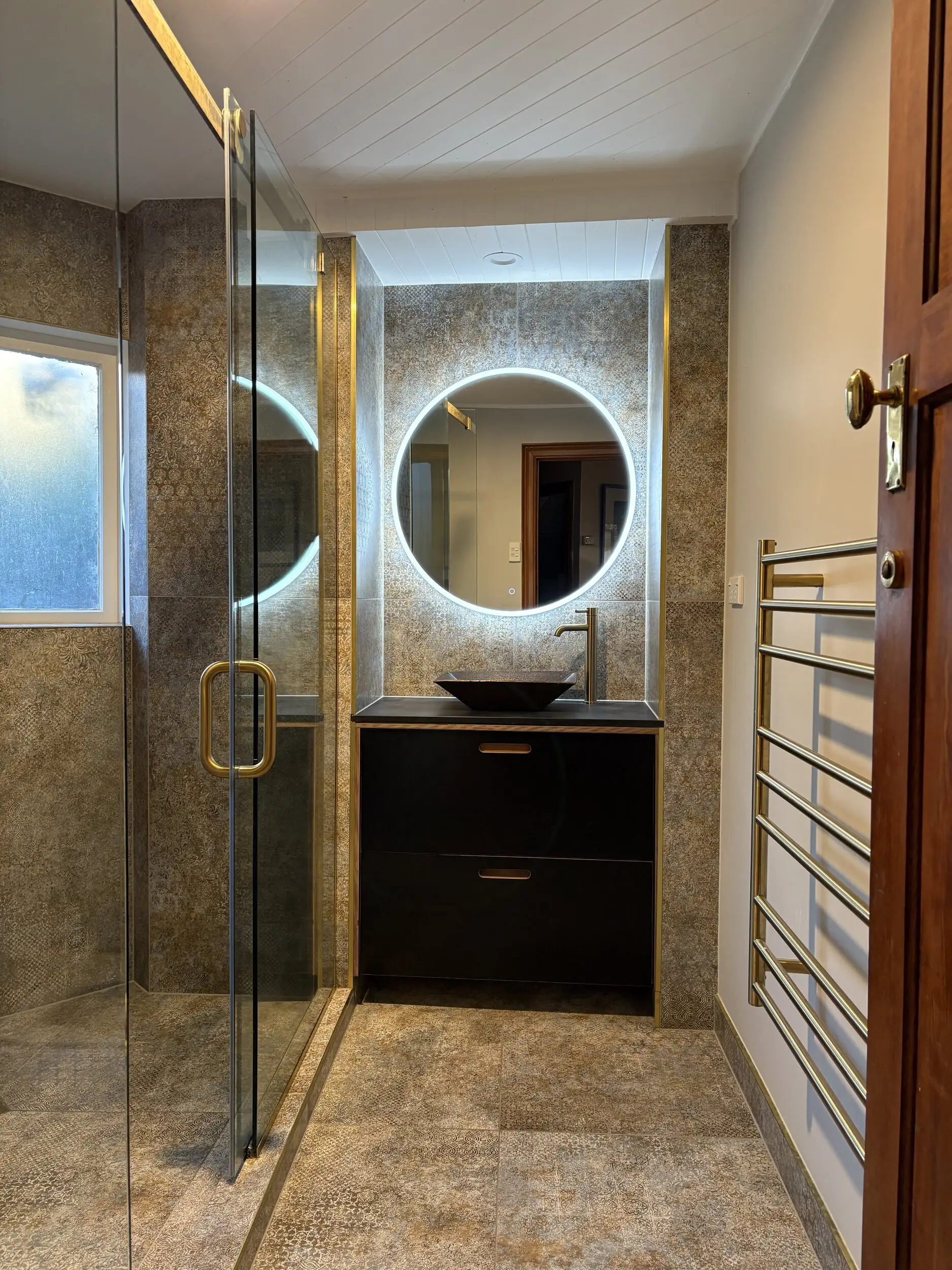 Refreshed bathroom with new vanity, mixer and shower