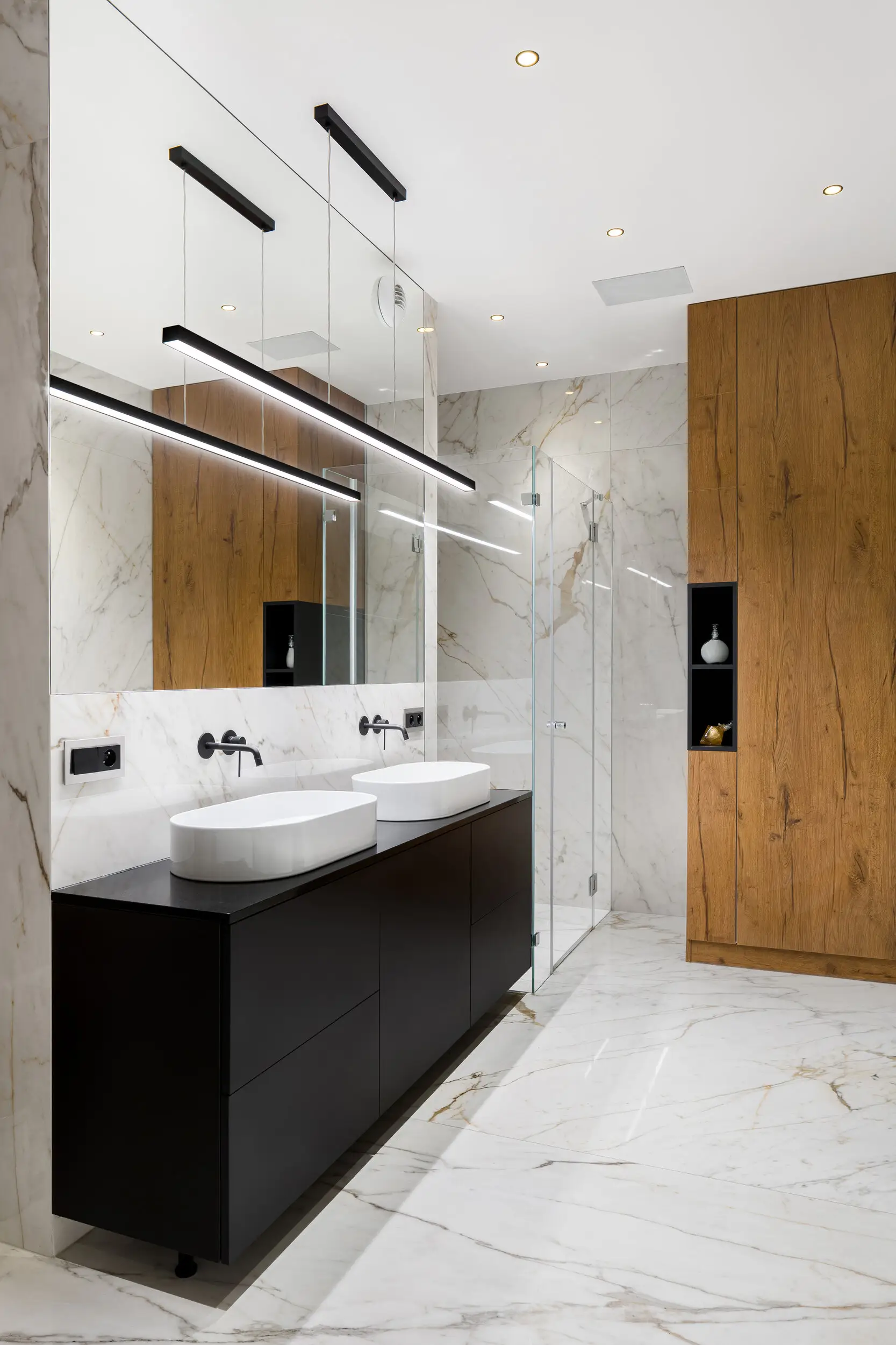 Renovated bathroom with skylight, freestanding bath and glass shower