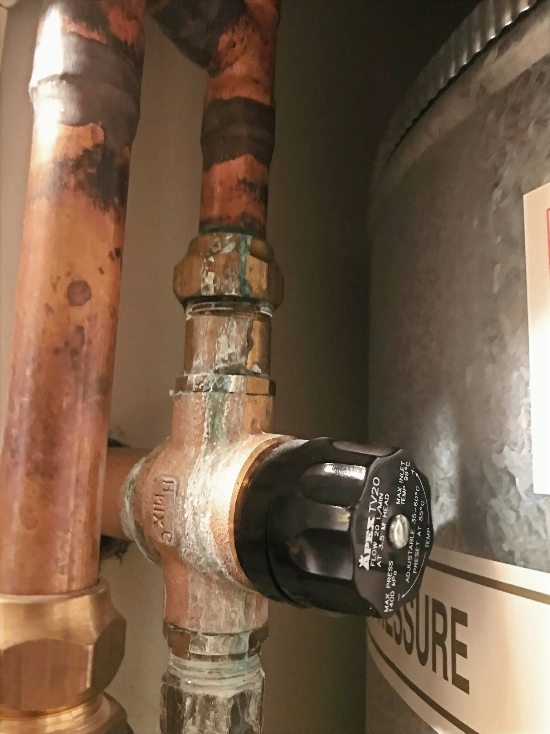 Copper pipework and isolating valve during a plumbing repair