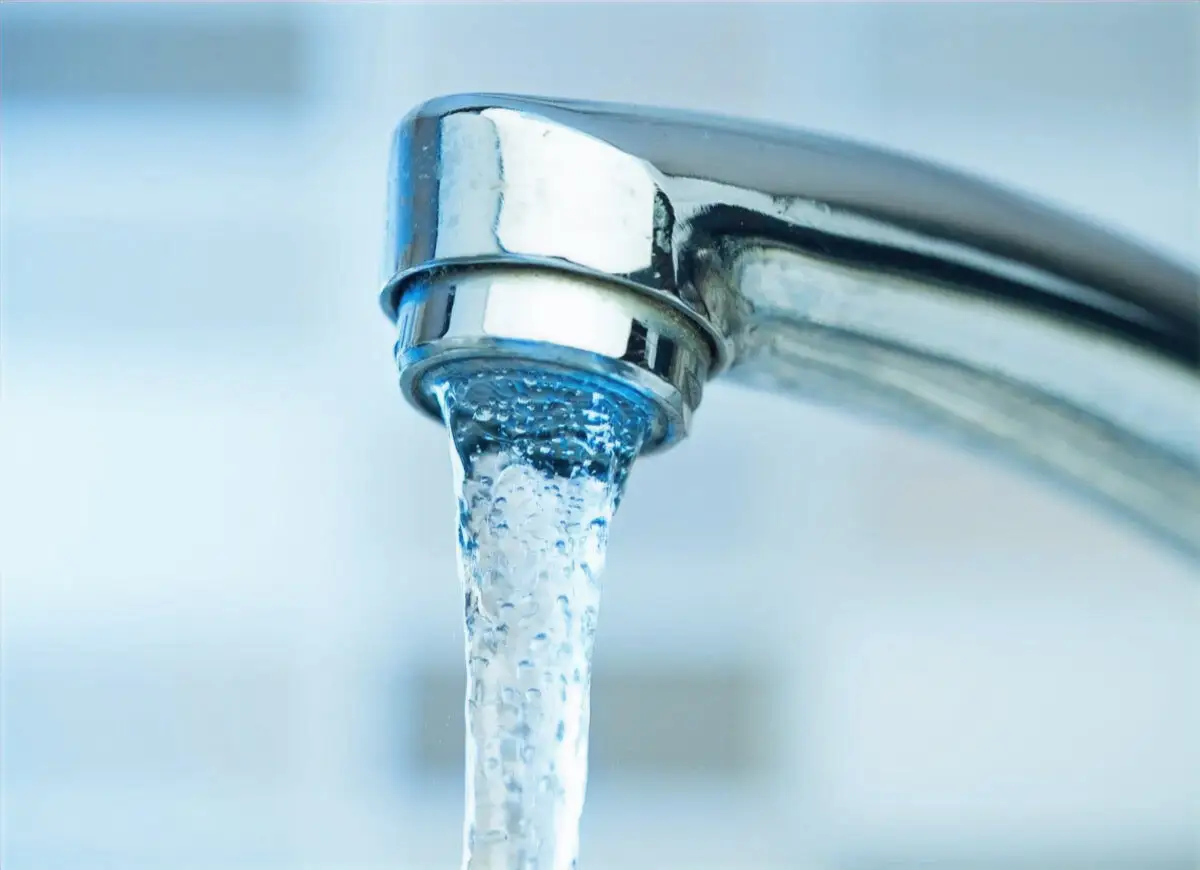 Hot water running from a chrome tap